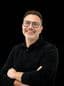 Simon Cohen, founder and principal stylist at Simon Warwick Salons in Maida Vale – expert in precision cutting, colour, and luxury hairdressing.